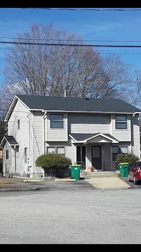 D.R.F Builders RI roofing crew working on asphalt shingles in Rhode Island